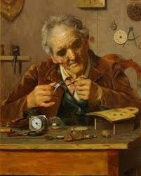 old watchmaker repairing a watch